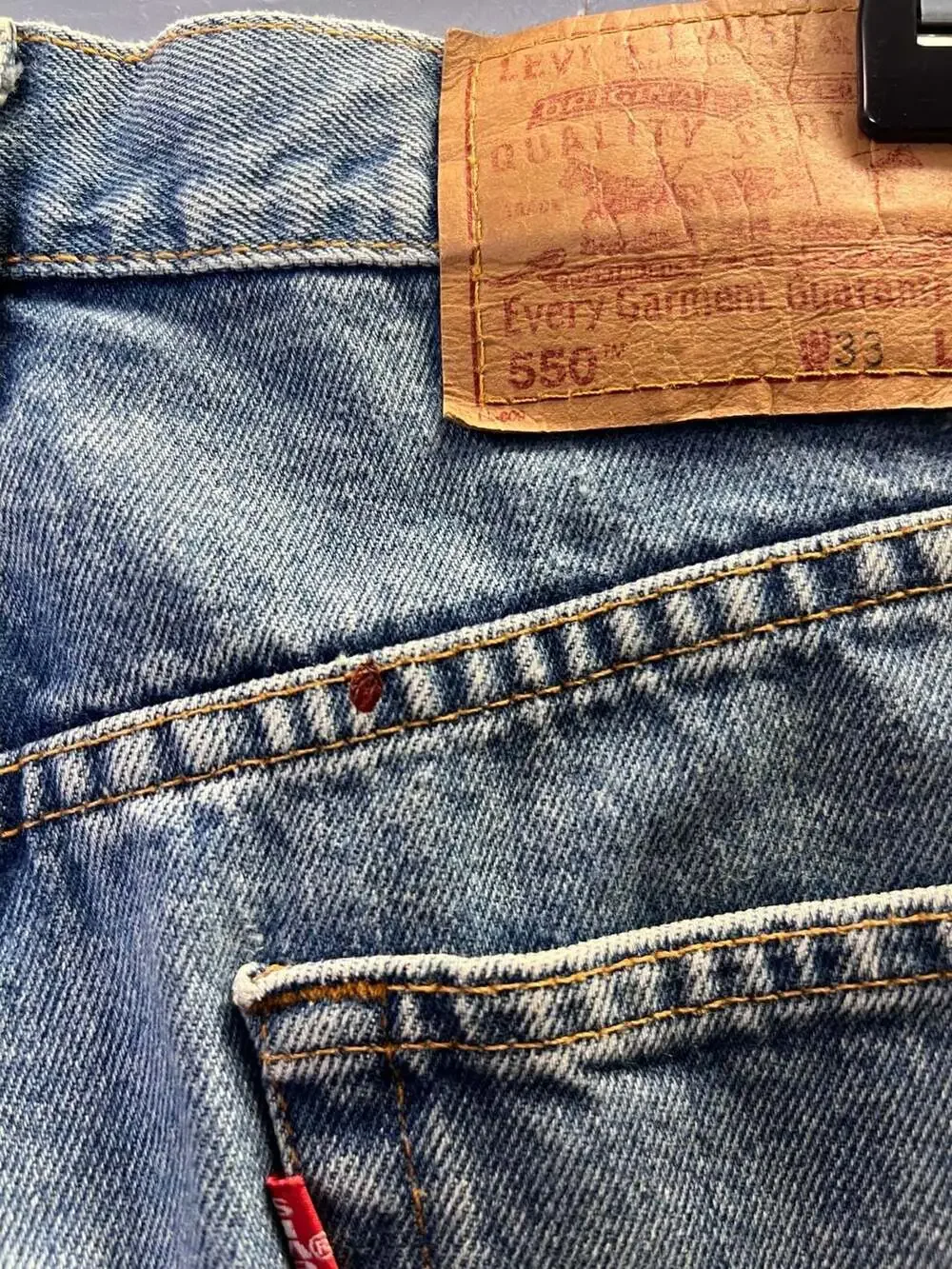 Vintage 2000 Levis 550 Relaxed Fit Tapered Jeans Mens 33x32 Medium Wash 0433